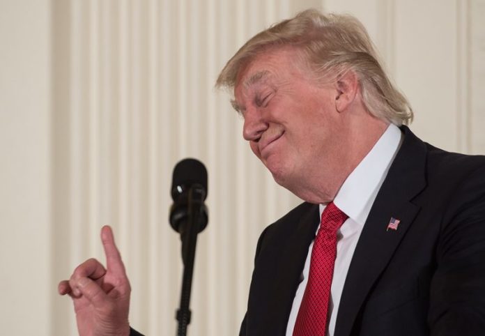 FILES-US-POLITICS-TRUMP-100DAYS