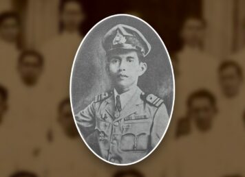 พระยาสัจจาภิรมย์อุมราชภักดี ถ่ายเมื่อ พ.ศ. 2467 ประกอบกับฉากหลัง