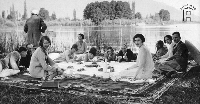 ชาวยุโรป ใน อินเดีย นั่ง ปิกนิก ริม ทะเลสาบ